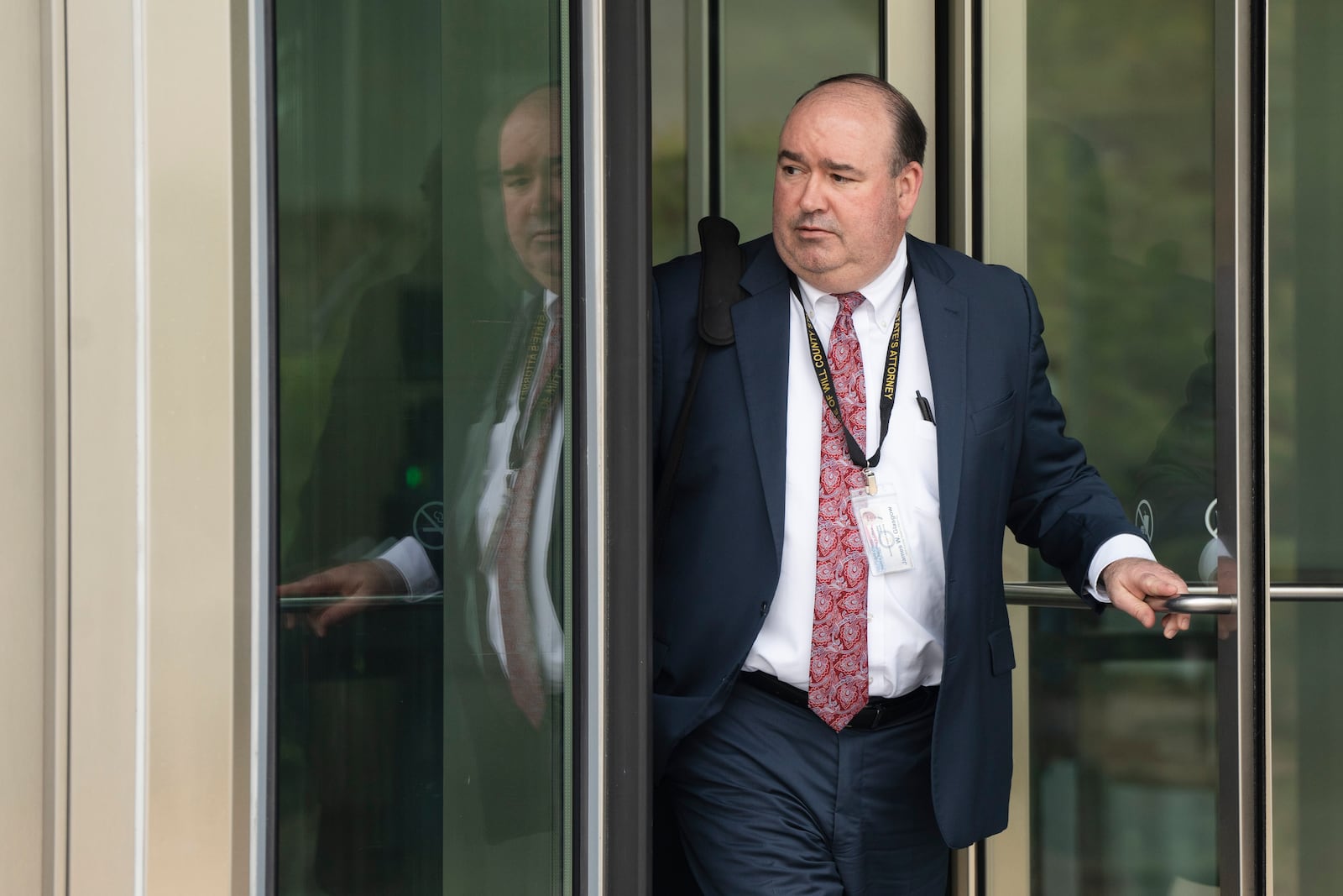 Will County Prosecutor Christopher Koch exits the Will County Courthouse after the sentencing of Joseph Czuba in Joliet, Ill., Friday, May 2, 2025. (Pat Nabong /Chicago Sun-Times via AP)