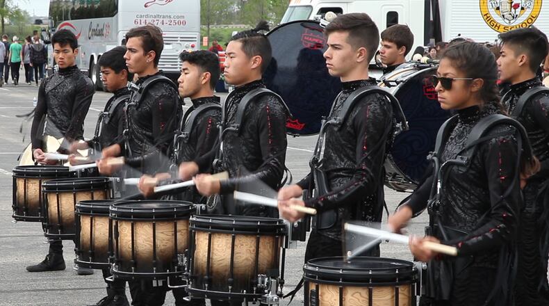 FILE PHOTO: More than 200 drum lines from places as far away as Thailand have converged in the Dayton region for WGI Sport of the Arts Percussion and Winds Championships. TY GREENLEES / STAFF