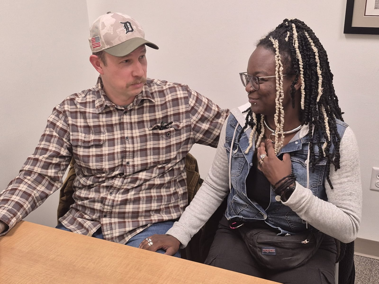 Steven McKee and his wife, Jasmine Defore, are frustrated by an apparent indifference by Washington to resolve the shutdown. McKee is an essential worker at Wright Patterson Air Force Base working without pay. MICHAEL KURTZ / STAFF