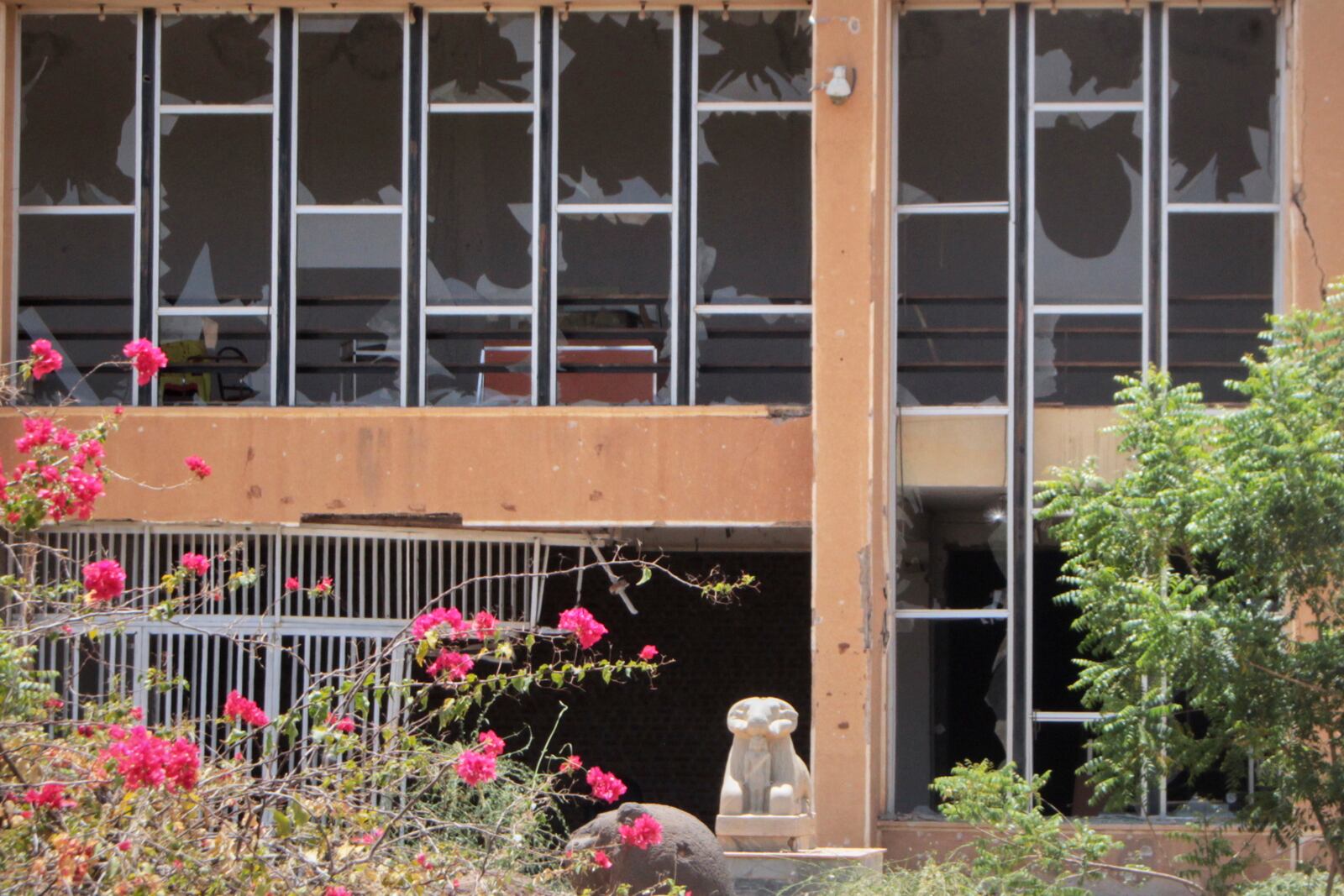Windows of the Sudan National Museum, the home to the country's largest artifacts that date to different eras of Sudanese history, are shattered after nearly two years of war between the army and paramilitary Rapid Support Forces (RSF), in Khartoum, Sudan, Thursday, April 3, 2025. (AP Photo/Khaled Abd Al Gader)