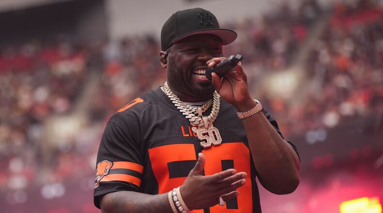 50 Cent performs a Canadian Football League game between the Calgary Stampeders and the BC Lions on Saturday, June 15, 2024, in Vancouver, British Columbia. (Darryl Dyck/The Canadian Press via AP)