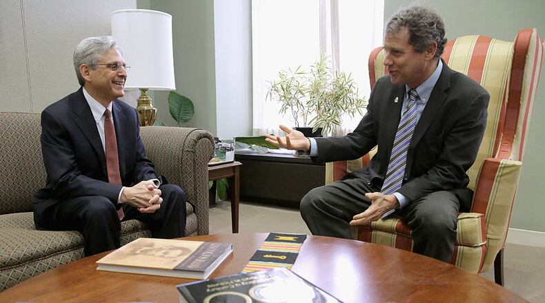 WASHINGTON, DC - APRIL 07: U.S. Supreme Court Justice nominee Merrick Garland (L) talks with Sen. Sherrod Brown (D-OH) in his office in the Hart Senate Office Building on Capitol Hill April 7, 2016 in Washington, DC. Garland is meeting with senators today while visiting Capitol Hill. (Photo by Chip Somodevilla/Getty Images)