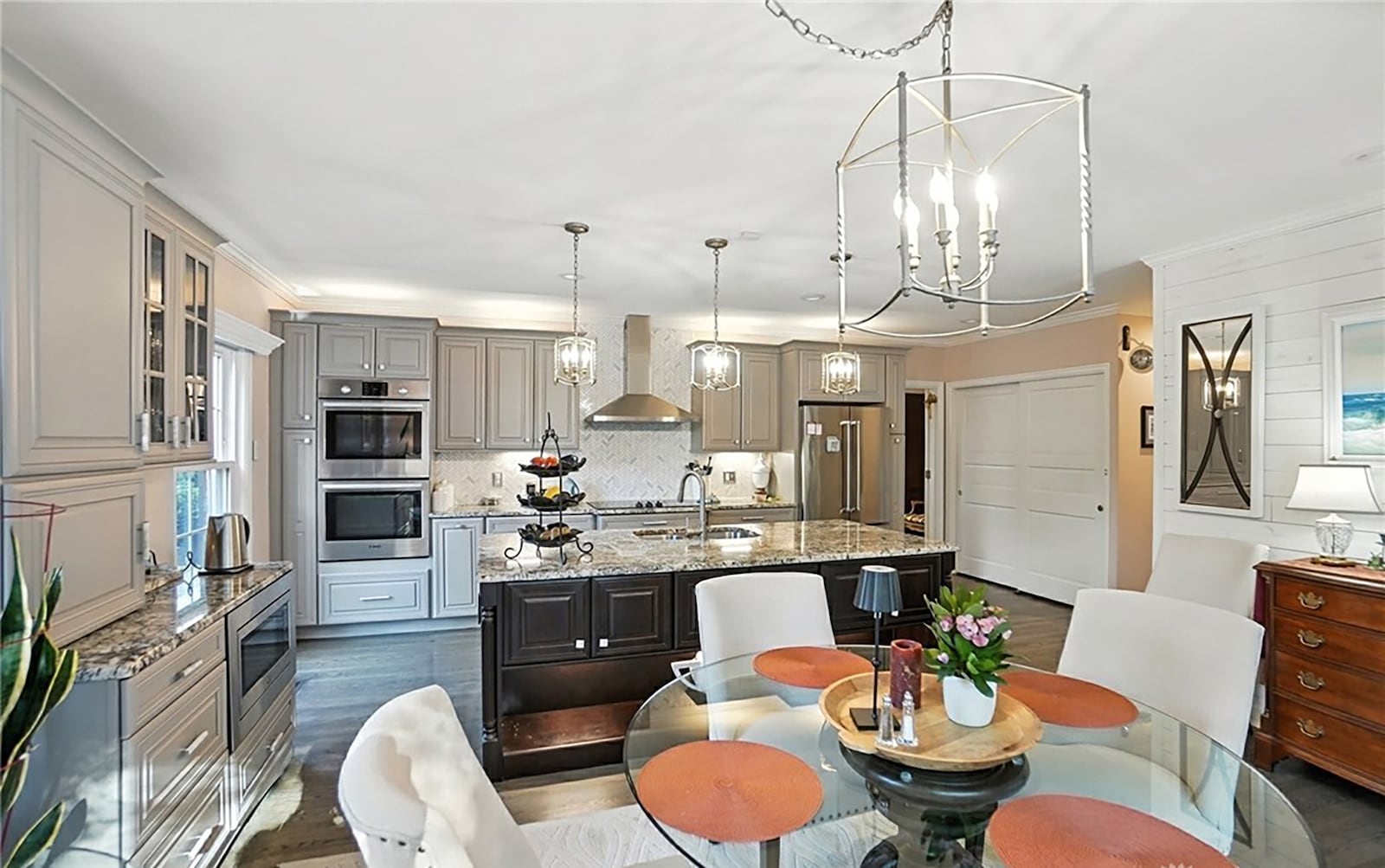 The kitchen has been completely remodeled and features upgraded stainless appliances, hardwood floors, recessed lighting and a breakfast area. CONTRIBUTED