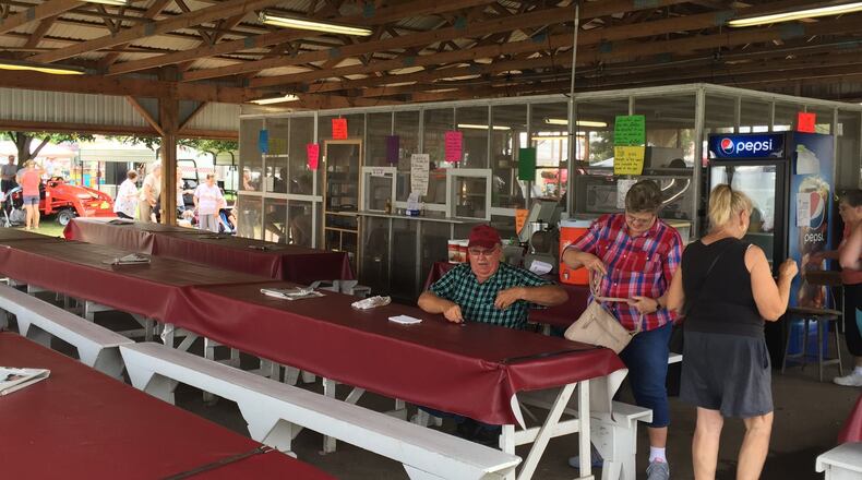 Grafton United Methodist Church in St. Paris is taking over the food pavilion at the Champaign County Fair from North Lewisburg United Methodist Church, which had operated the venue since 1963. LUCAS GONZALEZ/STAFF