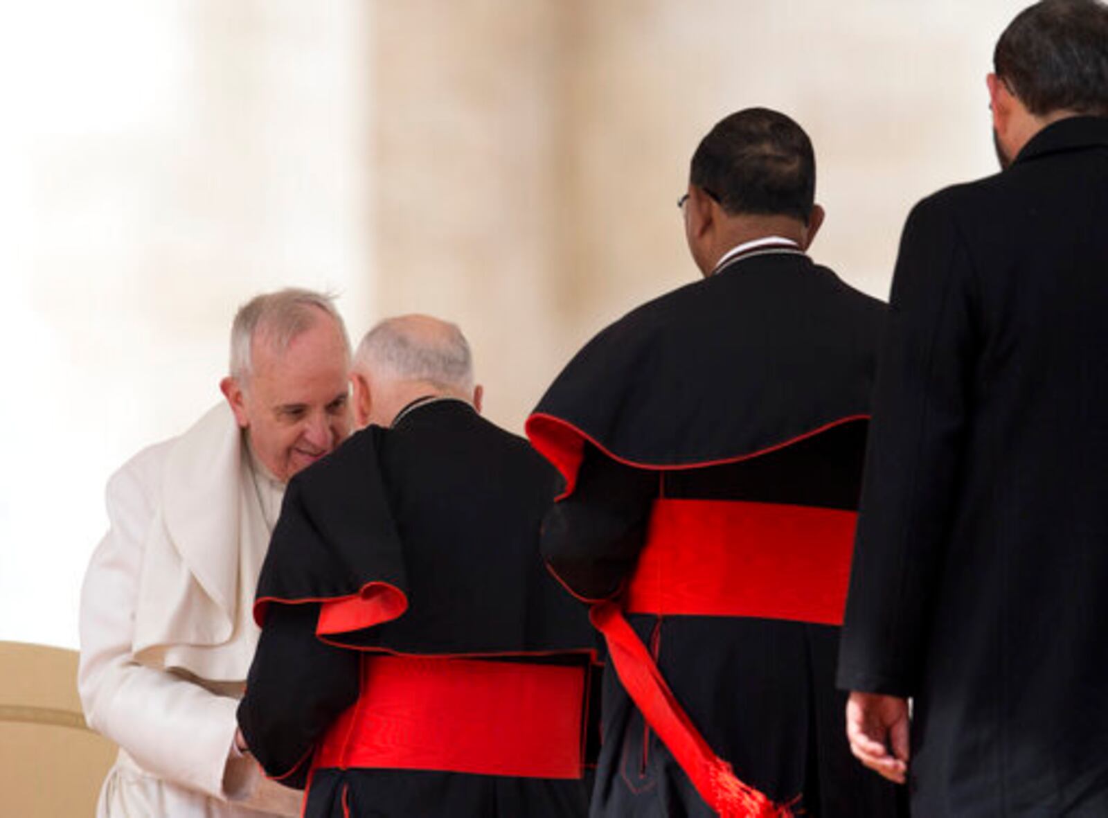 FILE - In this Feb. 19, 2014 file photo, Pope Francis greets U.S. cardinal Theodore Edgar McCarrick at the end of his general audience, in St. Peter's Square at the Vatican. (AP Photo/Alessandra Tarantino, file)