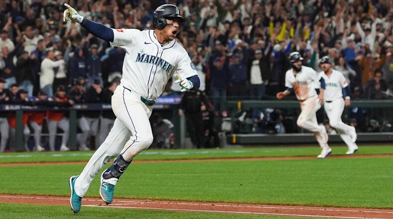 FILE - Seattle Mariners' Jorge Polanco reacts after hitting the game-winning RBI-single for J.P. Crawford to score during the 15th inning in Game 5 of baseball's American League Division Series against the Detroit Tigers, Friday, Oct. 10, 2025, in Seattle. (AP Photo/Lindsey Wasson, File)
