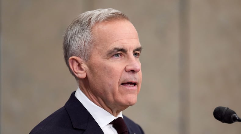 Canada's Prime Minister Mark Carney is seen during an news conference in Ottawa, Ontario, Wednesday, Nov. 26, 2025. (Adrian Wyld/The Canadian Press via AP)