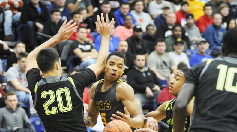 Springfield’s RaHeim Moss (middle) led the Wildcats with 19 points. Prolific Prep (Calif.) defeated Springfield 69-50 in the Premier Health Flyin’ to the Hoop at Trent Arena on Saturday, Jan. 19, 2019. MARC PENDLETON / STAFF