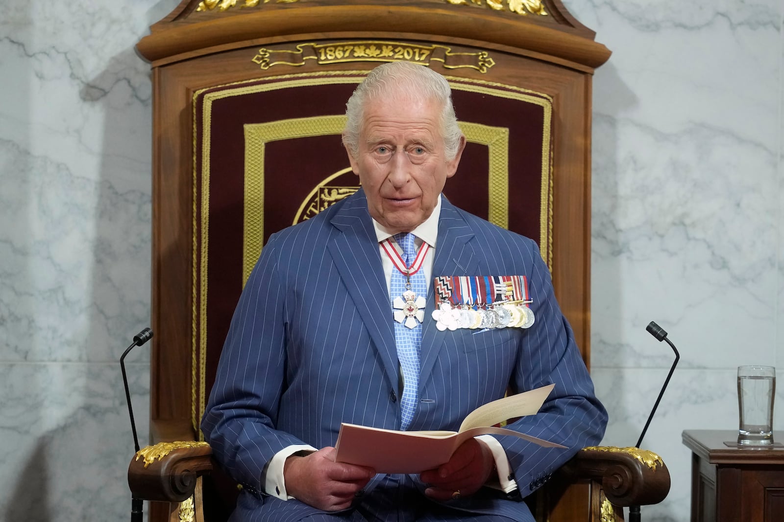 King Charles delivers the speech from the throne in the Senate in Ottawa, Canada on Tuesday, May 27, 2025. (Adrian Wyld/The Canadian Press via AP)