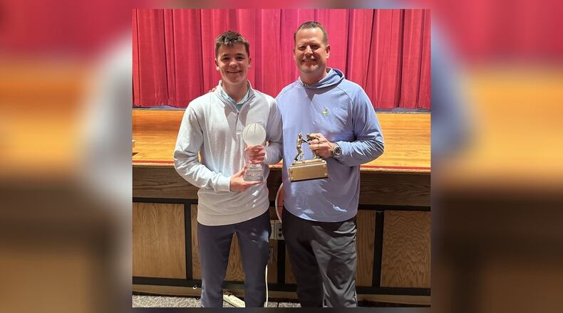 Tecumseh High School junior Chase Stafford and his father, Jon Stafford, pose with his trophies after he was named Dan Hoyt Mr. Basketball at the 2025 All-Clark County Coaches Boys Basketball banquet on Sunday, April 6 at Tecumseh High School. CONTRIBUTED PHOTO