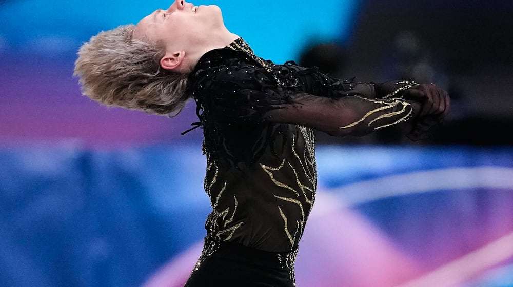 Ilia Malinin of the United States competes during the men's free skate program in figure skating at the 2026 Winter Olympics, in Milan, Italy, Friday, Feb. 13, 2026. (AP Photo/Natacha Pisarenko)