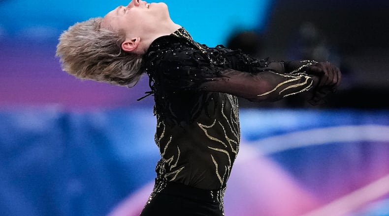 Ilia Malinin of the United States competes during the men's free skate program in figure skating at the 2026 Winter Olympics, in Milan, Italy, Friday, Feb. 13, 2026. (AP Photo/Natacha Pisarenko)