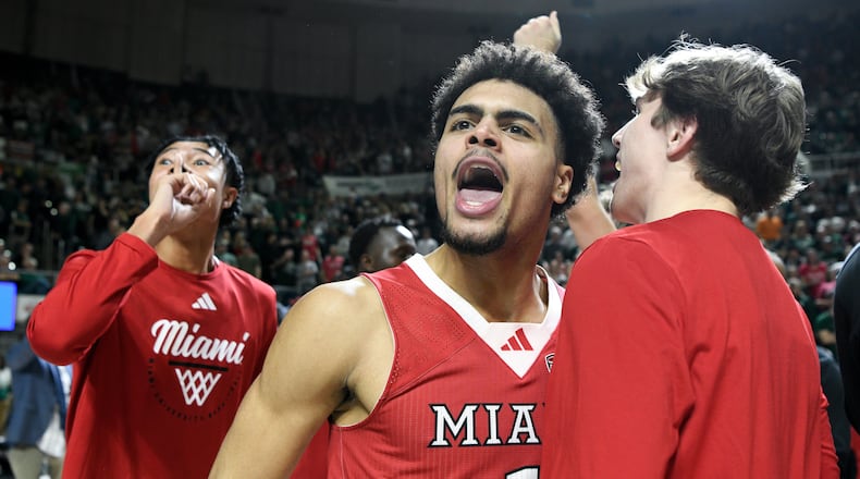 Miami (Ohio) guard Trey Perry reacts after defeating Ohio in an NCAA college basketball game, Friday, March 6, 2026, in Athens, Ohio. (AP Photo/HG Biggs)