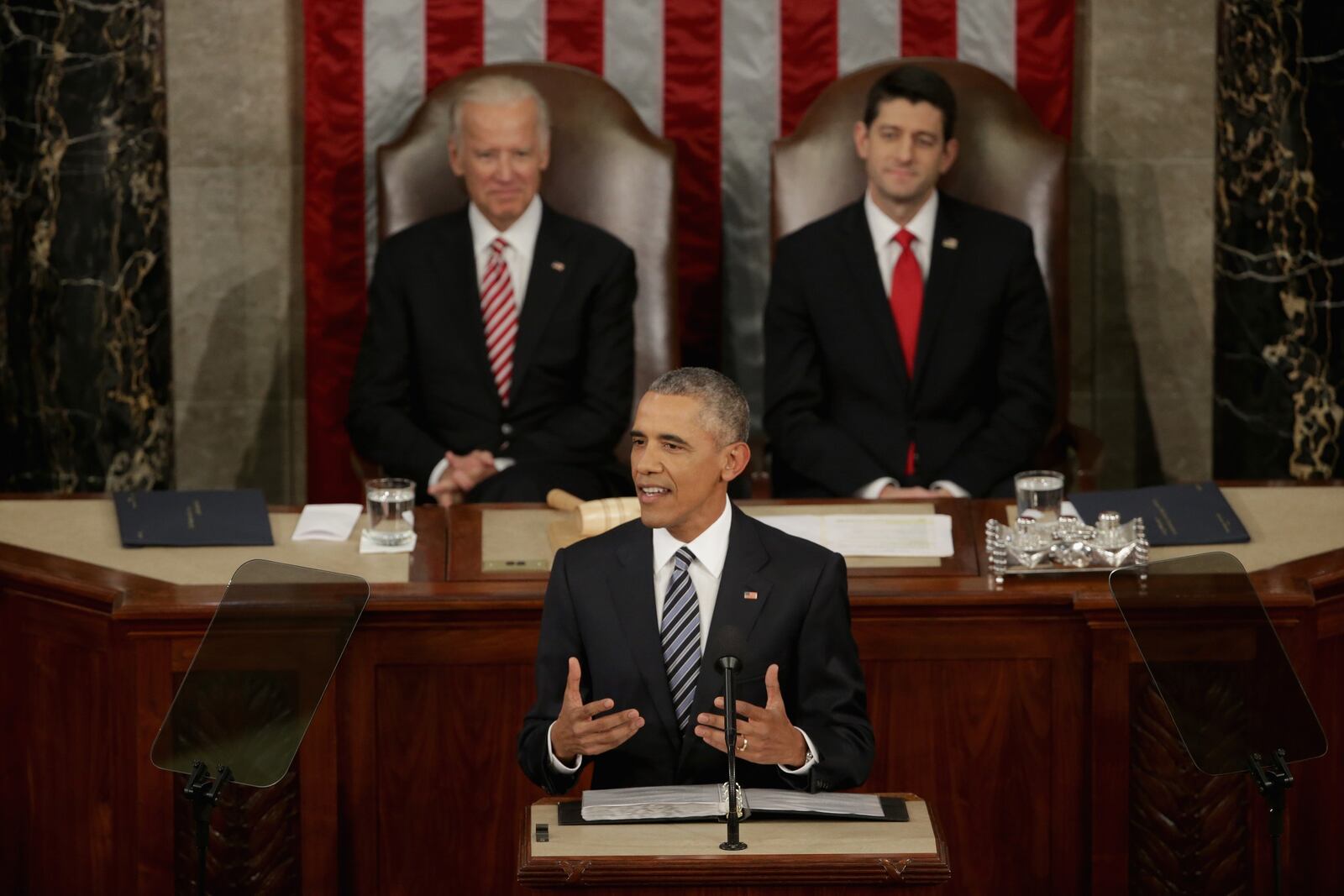 WASHINGTON, DC - JANUARY 12: U.S. President Barack Obama delivers the State of the Union speech before members of Congress in the House chamber of the U.S. Capitol January 12, 2016 in Washington, DC. In his last State of the Union, President Obama reflected on the past seven years in office and spoke on topics including climate change, gun control, immigration and income inequality. Also pictured are Vice President Joe Biden (L) and U.S. Speaker of the House Rep. Paul Ryan (R-WI). (Photo by Alex Wong/Getty Images)