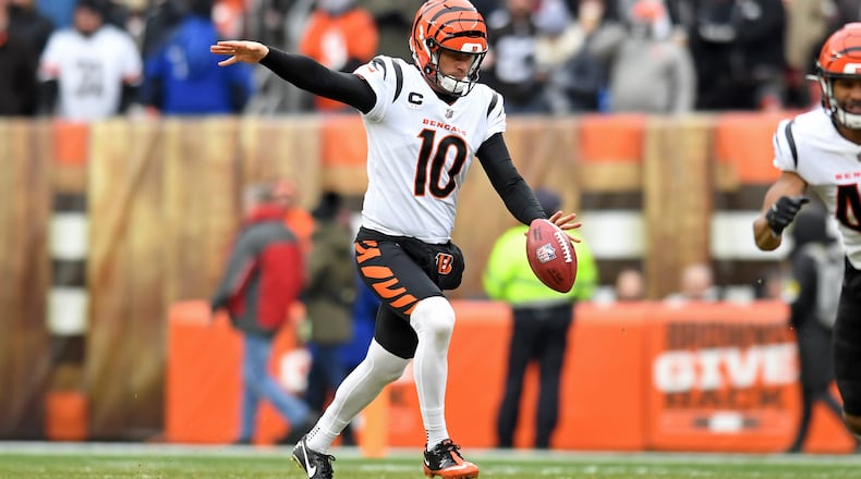 FILE - Cincinnati Bengals punter Kevin Huber (10) punts in the first half of an NFL football game against the Cleveland Browns, Sunday, Jan. 9, 2022, in Cleveland. Huber has been a Bengals fan all his life. He grew up in Cincinnati, went to college there and rooted for the city to celebrate a championship. The 36-year-old Bengals punter is the team’s longest-tenured player and he’s a victory away from helping deliver a Super Bowl title to his city - and fulfilling a dream that started as a young fan in the stands at Riverfront Stadium. (AP Photo/Nick Cammett, File)