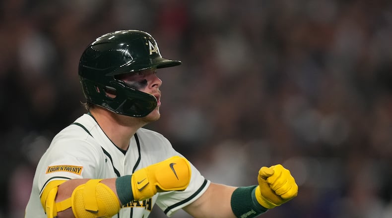 Australia's Travis Bazzana celebrates after hitting a solo home run against Taiwan in the seventh inning of a World Baseball Classic game in Tokyo, Thursday, March 5, 2026. (AP Photo/Hiro Komae)