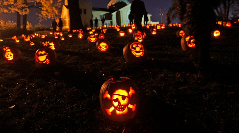 Judith Chaffin, known as the “The Pumpkin Lady,” began the Stoddard Avenue Pumpkin Glow in Dayton’s Grafton Hill neighborhood in 1994.  Chaffin died Dec. 21.  DAYTON DAILY NEWS STAFF FILE PHOTO