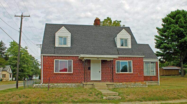 This brick home offers a fenced backyard and a detached, 2-car garage. The 3-bedroom home has a full basement and has received a number of updates. CONTRIBUTED PHOTO BY VICKIE KAPNAS