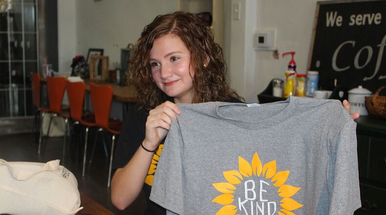 Mozie Vanraaij a student at Southeastern High School is selling Be Kind apparel to help stop bullying. JEFF GUERINI/STAFF