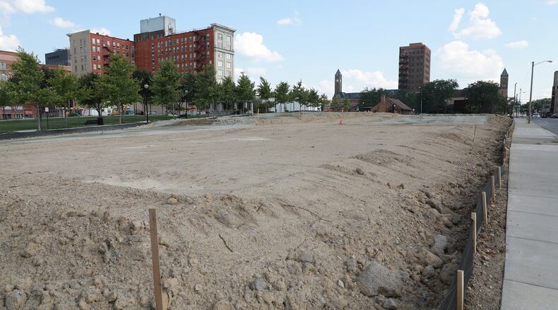 The site has been prepped and is just waiting for the new townhomes to be built along Center Street in downtown Springfield. BILL LACKEY/STAFF