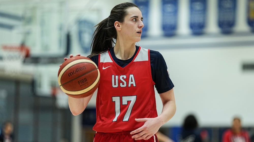FILE - Caitlin Clark (17) brings the ball upcourt during a training camp for the U.S women's national basketball team, Friday, Dec. 12, 2025, in Durham, N.C. (AP Photo/Matt Kelley, File)