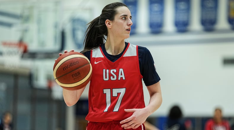 FILE - Caitlin Clark (17) brings the ball upcourt during a training camp for the U.S women's national basketball team, Friday, Dec. 12, 2025, in Durham, N.C. (AP Photo/Matt Kelley, File)