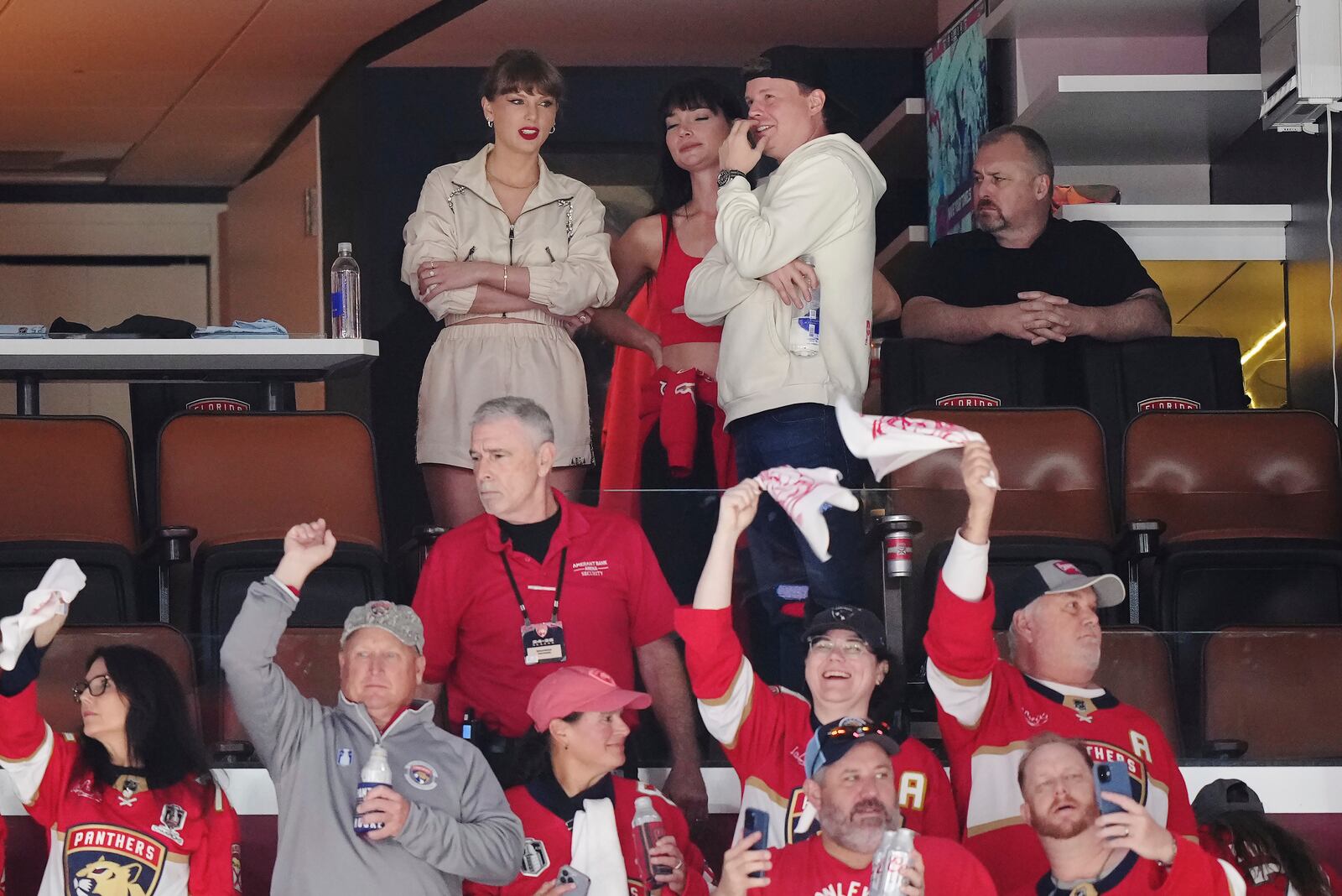 Singer Taylor Swift, top left, takes in the third period in Game 4 of the NHL hockey Stanley Cup Final between the Edmonton Oilers and the Florida Panthers in Sunrise, Fla., Thursday, June 12, 2025. (Nathan Denette/The Canadian Press via AP)