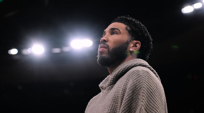 Boston Celtics forward Jayson Tatum stands next to bench during the first half of an NBA basketball game, Wednesday, March 4, 2026, in Boston. (AP Photo/Charles Krupa)