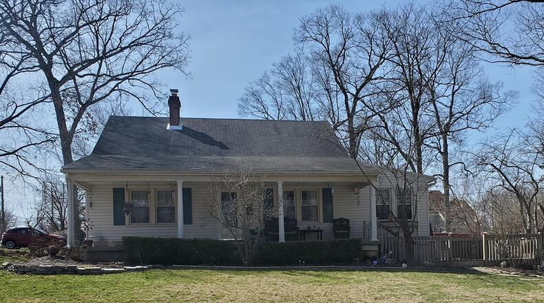 Offering about 1,910 square feet of living space, the home has four bedrooms and two baths. The front features a covered concrete porch that extends almost the width of the home. There is a wooden deck with railing connected to the front of the house that provides additional space. CONTRIBUTED PHOTO