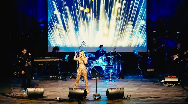 Singer Sabrina Plaisance-Sia will bring the magic of the late legendary pop singer Olivia Newton-John and 22 of her hits to the Clark State Performing Arts Center on Saturday with "The Olivia Show" to open the Springfield Arts Council's Showtime! winter season.