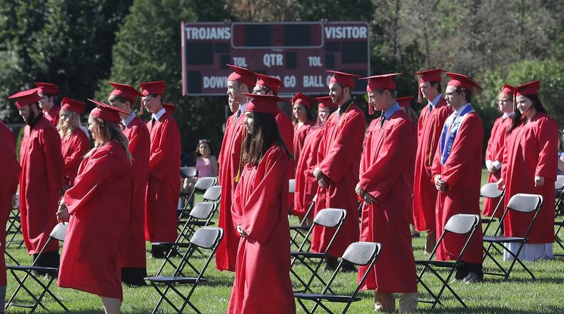 Southeastern High School had a semi-traditional commencement ceremony, with social distancing, Saturday on the schools football field. BILL LACKEY/STAFF