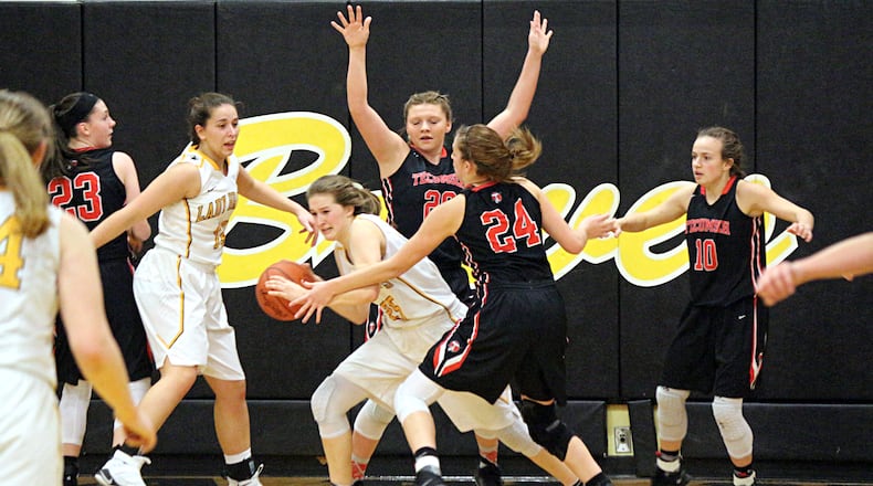 Shawnee’s Andi Meeks (with ball) looks for a shot as teammate Olivia Potts (14) looks on against Tecumseh defender Presley Griffitts (24), Macy Berner (20) and Kylee Mastin (10). Greg Billing/CONTRIBUTED