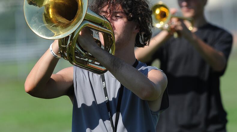 Members of the West Carrollton Marching Band practice Thursday, Aug. 11, 2022. MARSHALL GORBY/STAFF