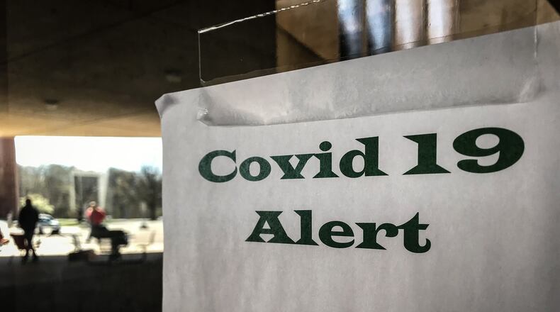 Wright State University library is closed along with all university buildings because of the coronavirus Monday morning. The university is considering other cost cutting measures. JIM NOELKER/STAFF