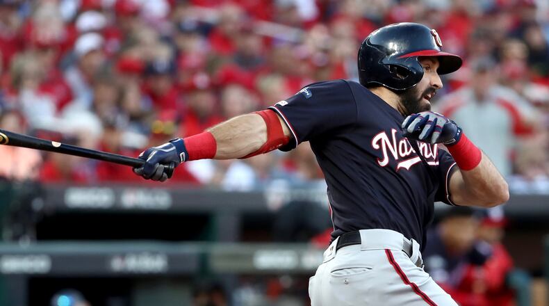 The Nationa's Adam Eaton hits a two-run RBI double during the eighth inning of game two of the National League Championship Series against the St. Louis Cardinals at Busch Stadium on October 12, 2019 in St Louis, Missouri. (Photo by Jamie Squire/Getty Images)