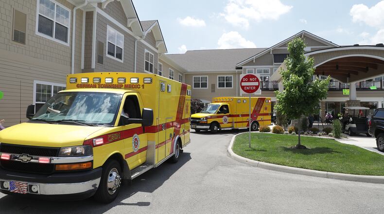 Several events will be held in Clark and Champaign Counties this week, including the Wooded Glen Senior Health and Wellness Day on Thursday. Here, family members waved to residents at Wooded Glen Senior Living during a parade when residents had limited contact with their loved ones during COVID. FILE/BILL LACKEY/STAFF