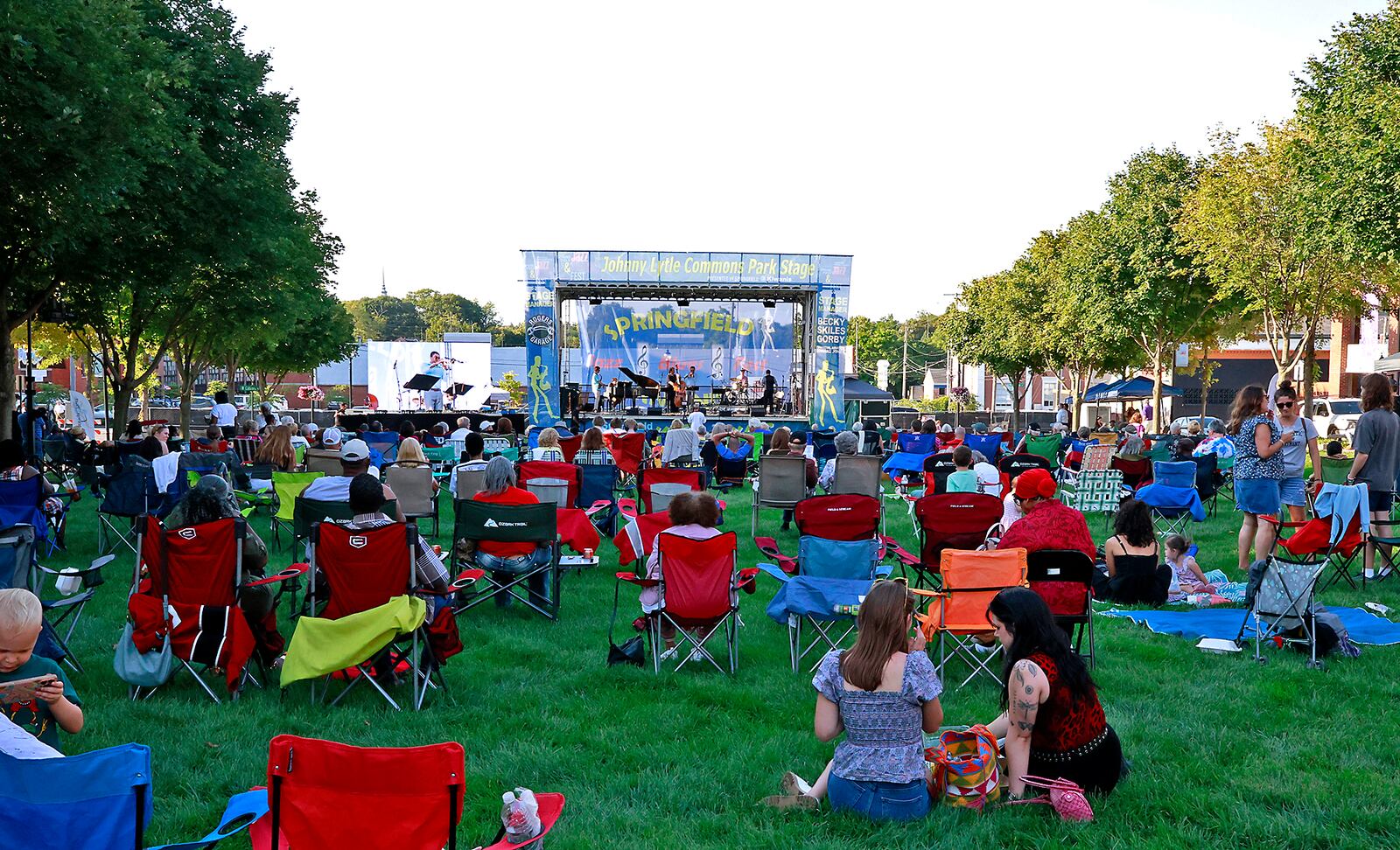 The lawn at National Road Commons park was full of music lovers for the third annual Springfield Jazz & Blues Fest Friday, August 9, 2024. The musical event, at the Commons park and Mother Stewart's Brewing Co., is presented by the Springfield Kiwanis and features 18 acts featuring national, regional and local performers. The event will continue through Saturday evening. BILL LACKEY/STAFF