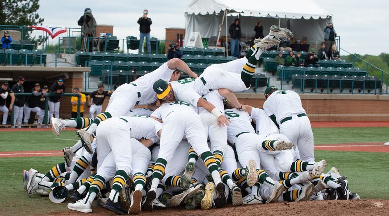 The Wright State baseball team celebrates after beating Milwaukee 21-3 in the Horizon League title game Saturday at Nischwitz Stadium. Wright State Athletics photo