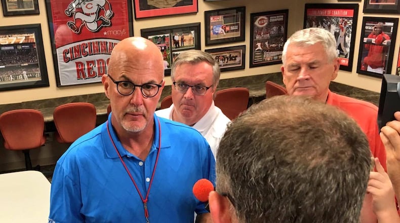 Reds Medical Director Dr. Tim Kremchek speaks to reporters on Monday. David Jablonski/Staff