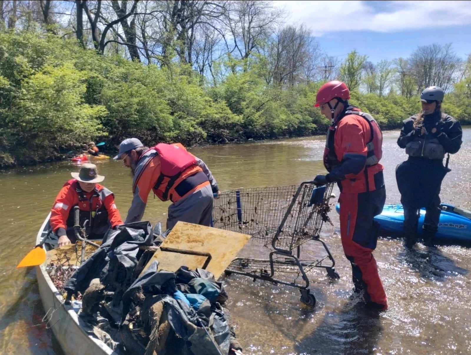 A group of volunteers working with Water Safe Ohio, including kayakers from across the state, performed a cleanup of Buck Creek in Springfield on Sunday, April 27. Photos courtesy Steve Miller @ Marked Imagery