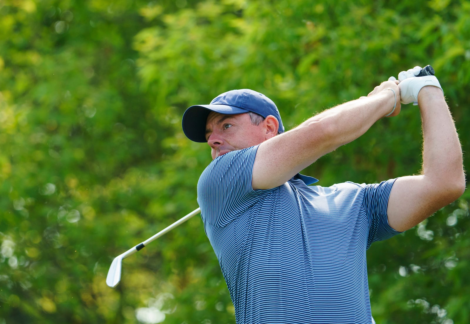 Rory McIlroy watches his ball after a swing during the pro-am at the Canadian Open Golf golf tournament, Wednesday, June 4, 2025, in Caledon, Ontario. (Peter Power/The Canadian Press via AP)