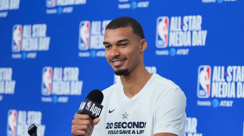 San Antonio Spurs' Victor Wembanyama talks to reporters during the NBA All-Star basketball game media day Saturday, Feb. 14, 2026, in Inglewood, Calif. (AP Photo/Jae C. Hong)
