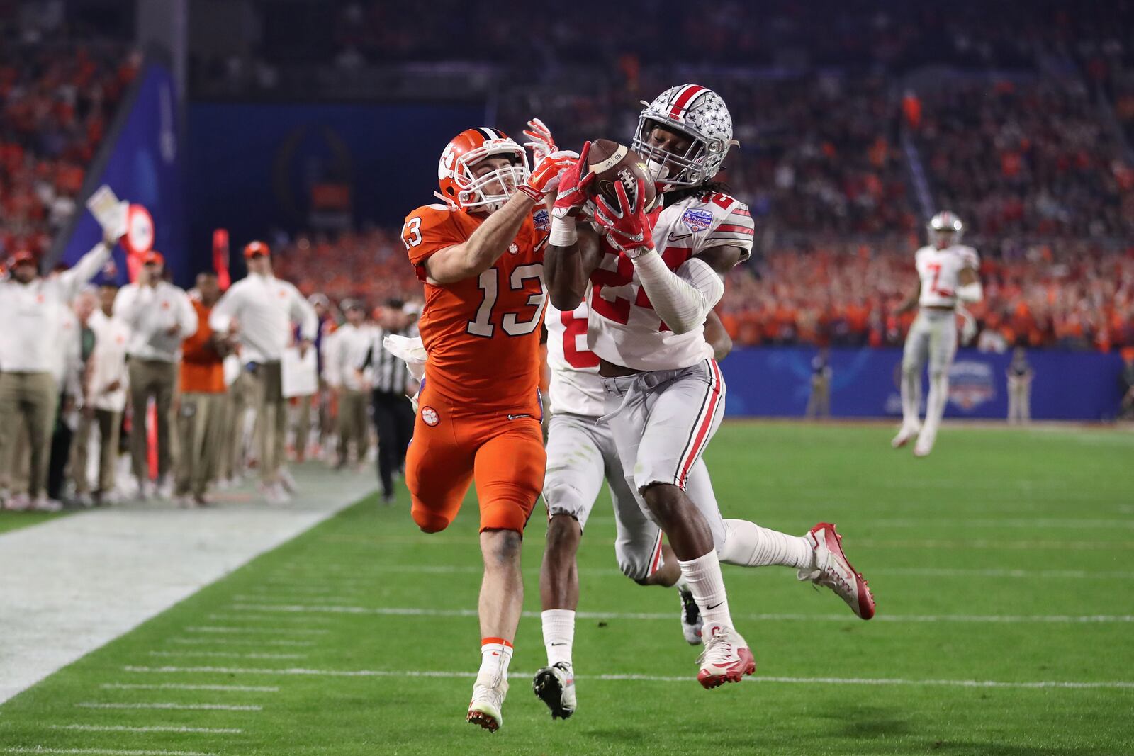 GLENDALE, AZ - DECEMBER 31: Malik Hooker #24 of the Ohio State Buckeyes intercepts a pass intended for Hunter Renfrow #13 of the Clemson Tigers during the first half of the 2016 PlayStation Fiesta Bowl at University of Phoenix Stadium on December 31, 2016 in Glendale, Arizona. (Photo by Christian Petersen/Getty Images)