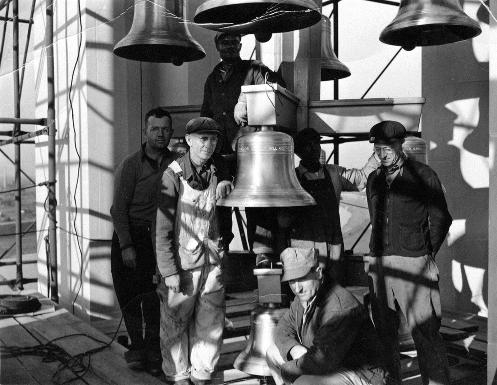 Men install the carillon bells at the Deeds Carillon. Deeds Carillon towers 151-feet in the air; comprised of 57 bells, it is Ohio s largest. CONTRIBUTED PHOTO, DAYTON HISTORY