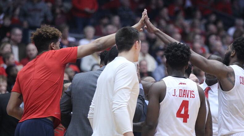 Dayton players huddle during a game against Georgia State on Dec. 16, 2017, at UD Arena. David Jablonski/Staff