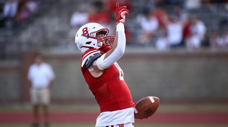 Wittenberg's Troy Teepe celebrates a touchdown against Kenyon on Saturday, Sept. 16, 2023, at Edwards-Maurer Field in Springfield. David Jablonski/Staff