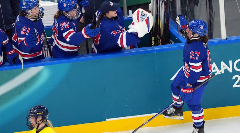 United States' Taylor Heise (27) celebrates after scoring a goal against Sweden during the second period of a women's ice hockey semifinal match at the 2026 Winter Olympics, in Milan, Italy, Monday, Feb. 16, 2026. (AP Photo/Carolyn Kaster)