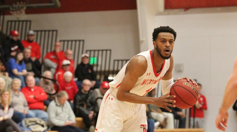 Wittenberg’s Landon Martin looks to make a pass against Ohio Wesleyan in the semifinals of the NCAC tournament on Tuesday, Feb. 25, 2020, at Pam Evans Smith Arena in Springfield. Wittenberg photo