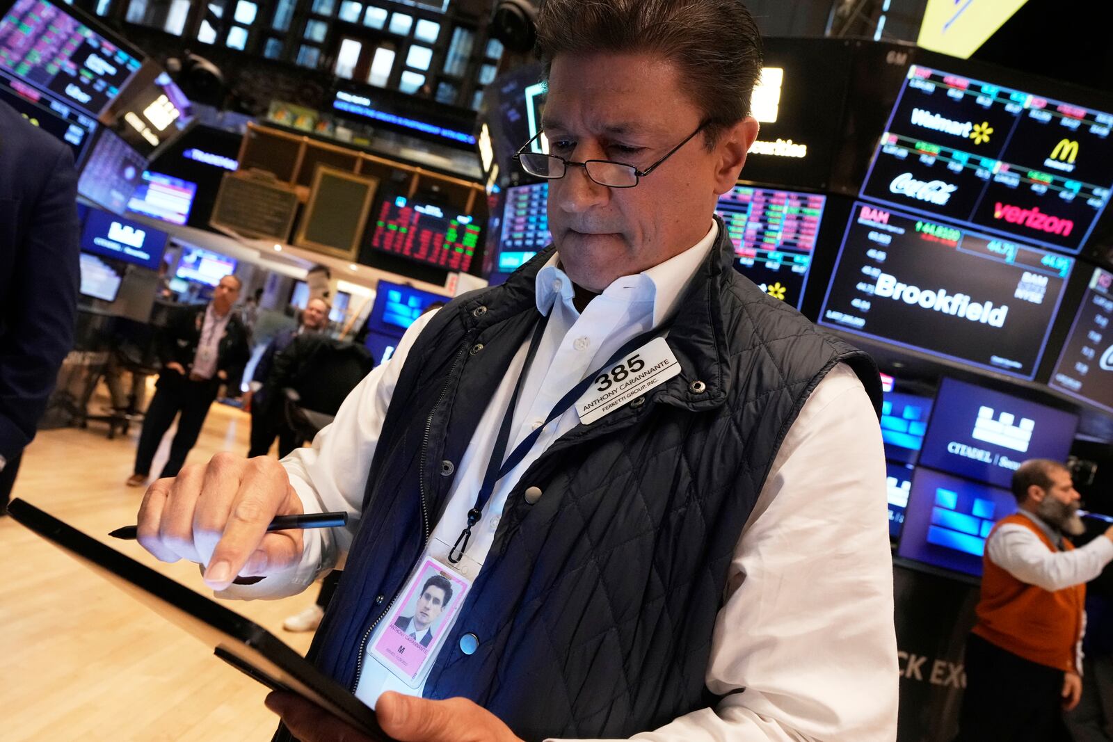 Trader Anthony Carannante works on the floor of the New York Stock Exchange, Friday, April 4, 2025. (AP Photo/Richard Drew)