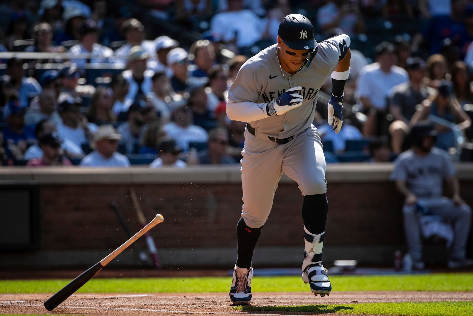 New York Yankees' Aaron Judge drops his bat after hitting a single during the first inning of a baseball game against the New York Mets, Saturday, July 5, 2025, in New York. (AP Photo/Angelina Katsanis)